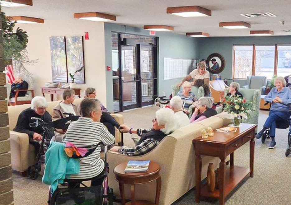 group of elders in the community area having a conversation