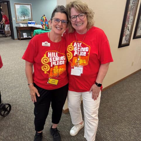 Two women in Hill Street price is right t-shirts