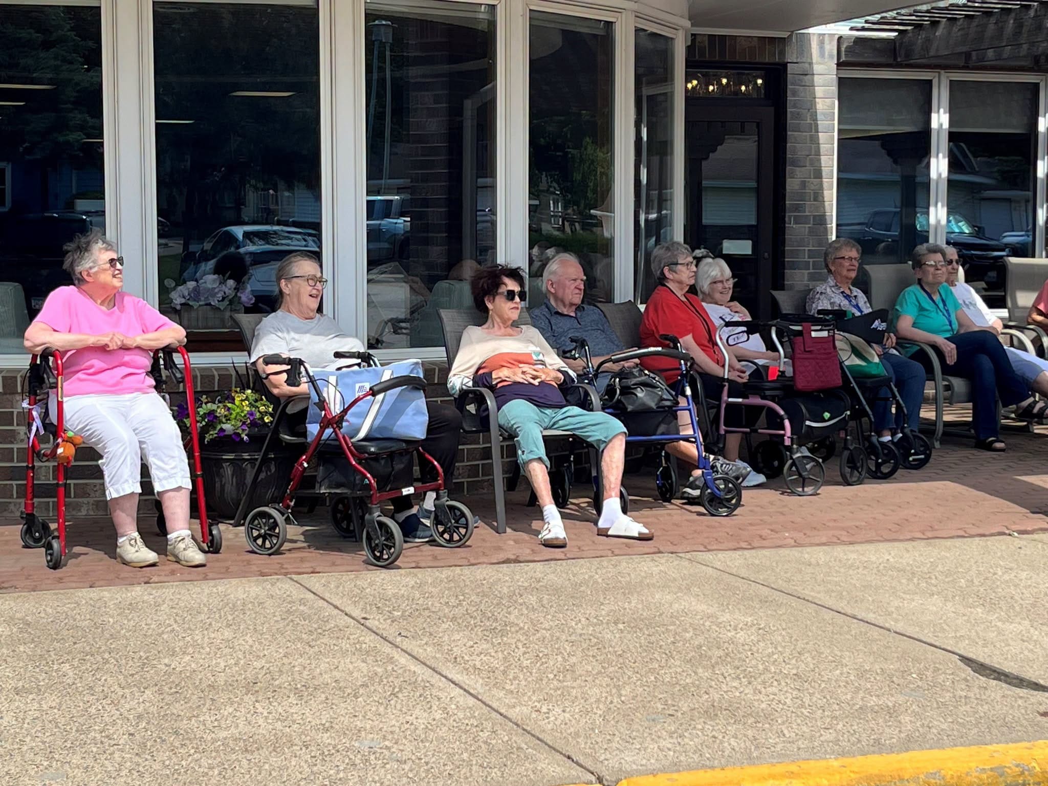 tenants at hill street place sitting outside