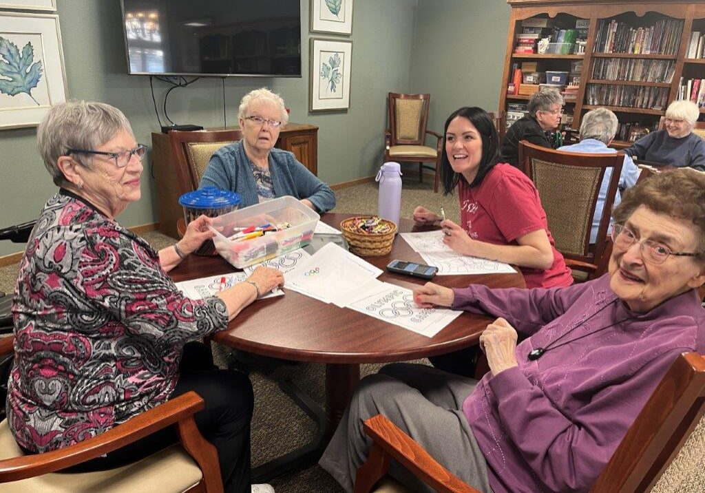 tenants at table coloring at Hill Street Place