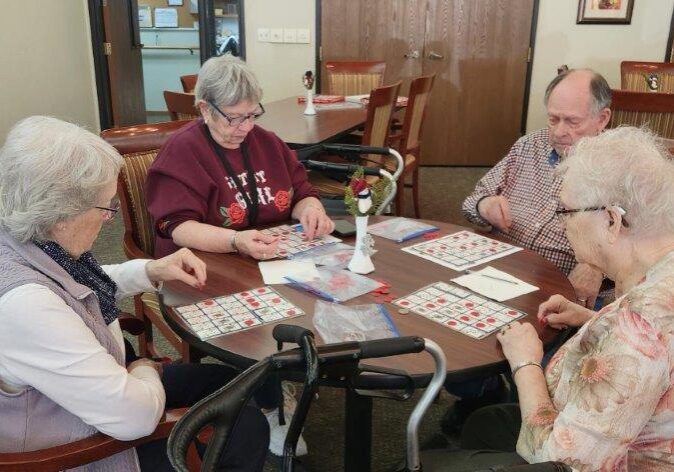 tenants playing pokeno in common area