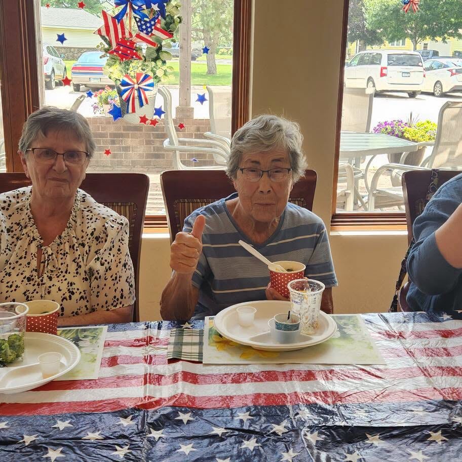 women giving thumbs up for their dinner